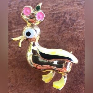 Vintage pin Duckling yellow Enamel Pink Flower Easter Bonnet Goldtone about 1.5”